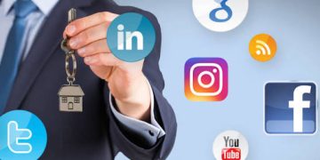 Businessperson presenting a key while social media icons float around, symbolizing social media security (LinkedIn, Instagram, YouTube, Facebook, Twitter, Google)./** concise **/